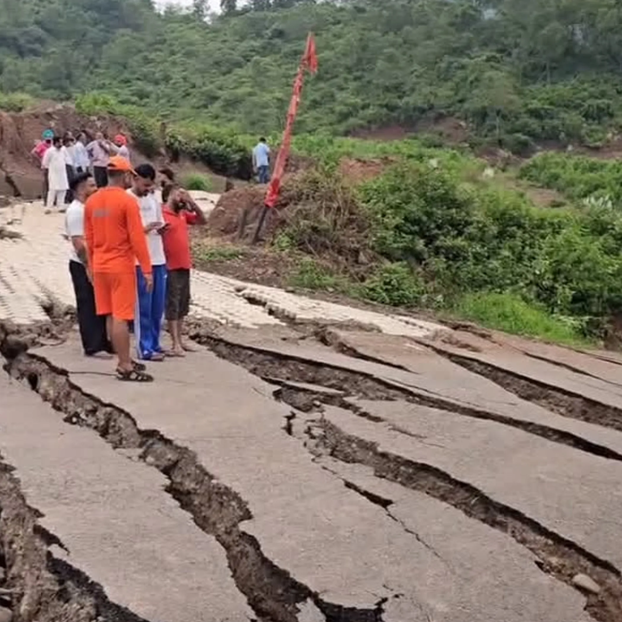 severe landslide damage and road collapse