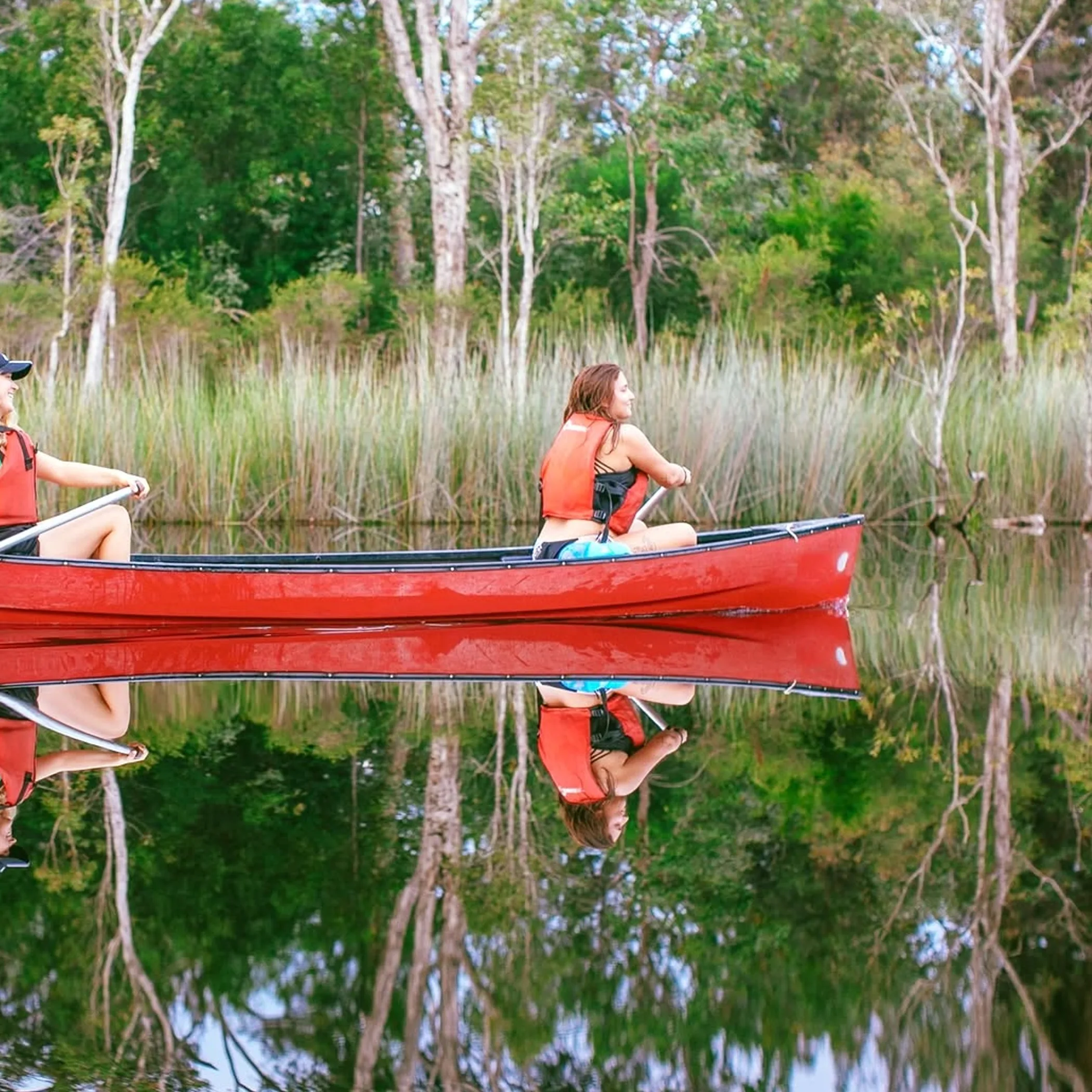 canoeing on reflective waterways